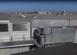 Jongejans Luchttechniek's complete extraction system on the outside of the AWEX factory, with air ducts and a chain filter installation.